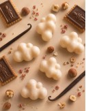 Fondants parfumés en forme de nuages délicats en cire végétale. Senteur gourmande biscuitée chocolat.Madeleine de Pourpre.